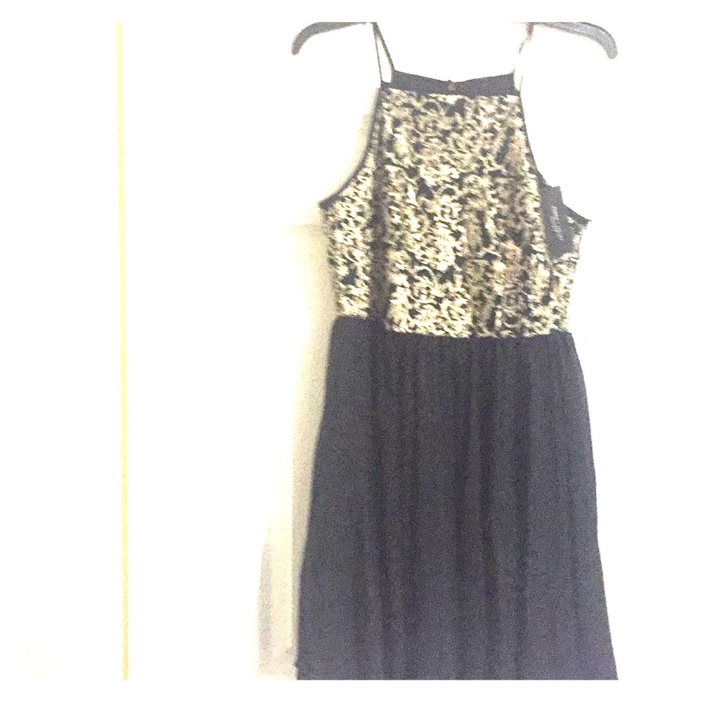 Black dress with gold pattern top